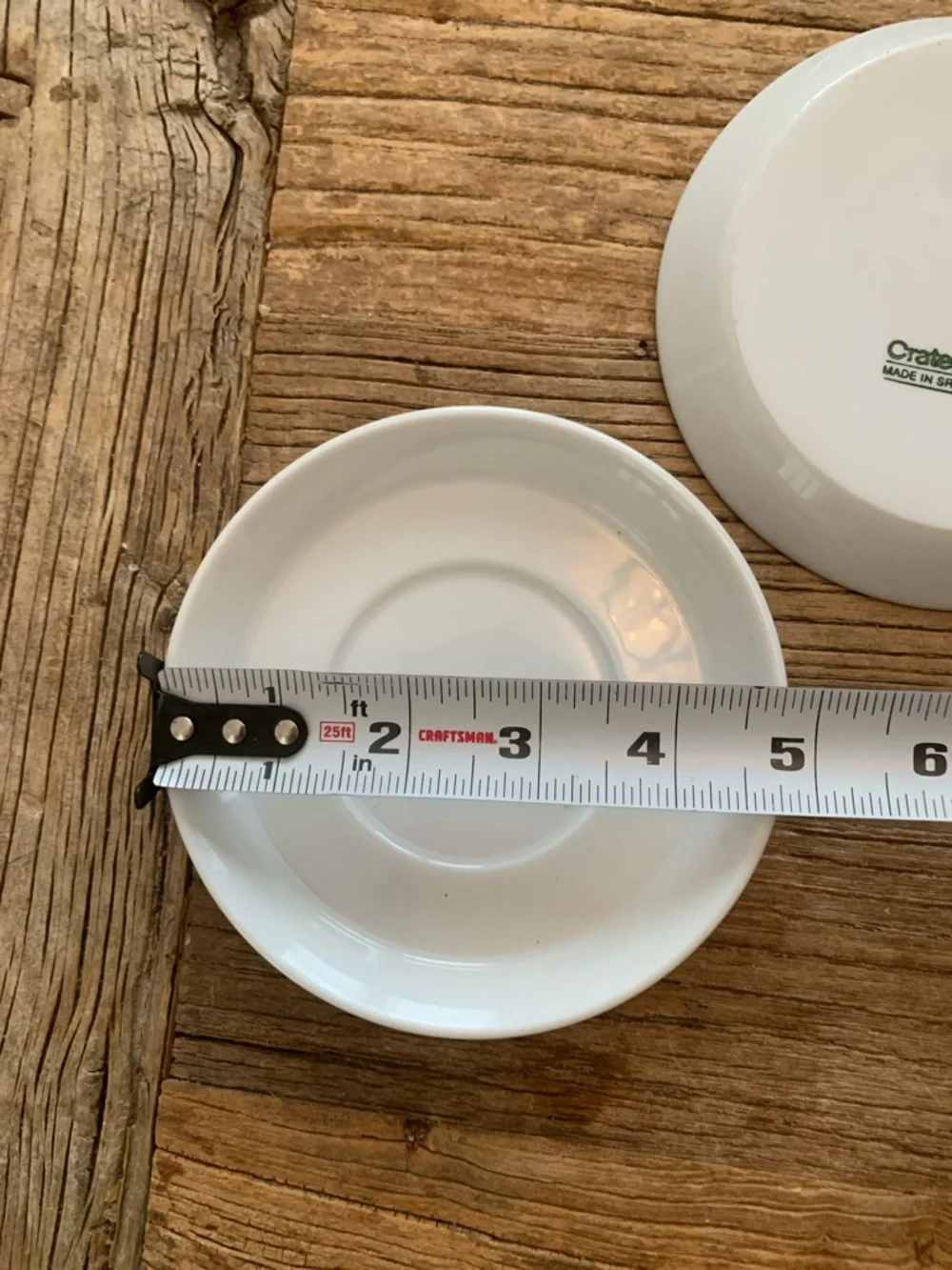 Two Crate and Barrel Espresso Saucers